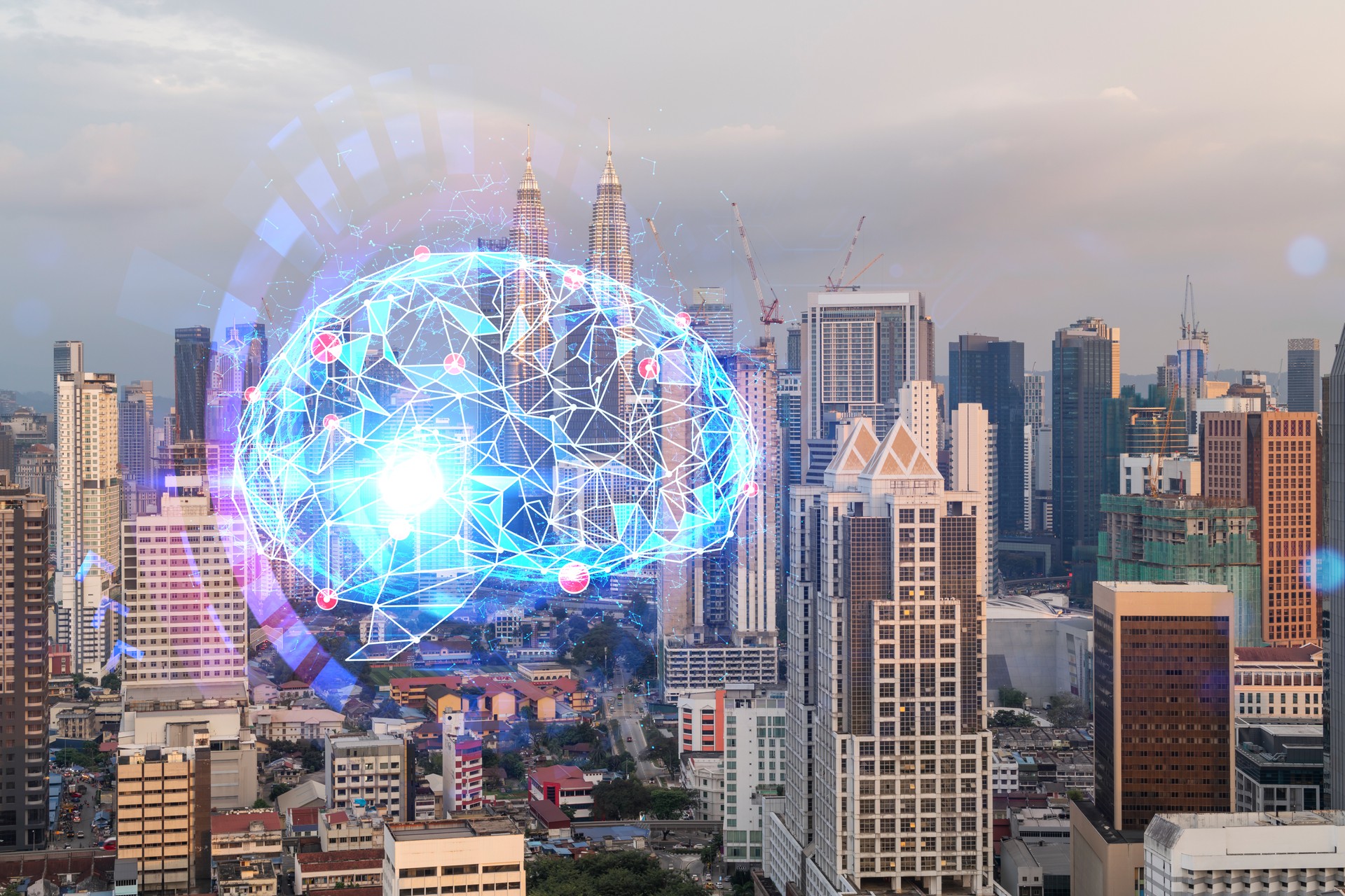 Glowing human brain hologram, aerial panoramic cityscape of Kuala Lumpur at sunset. KL is the center of business education in Malaysia, Asia. Double exposure.